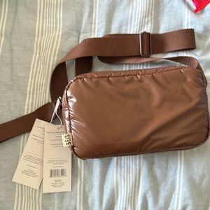 The expandable pouch beis Maple